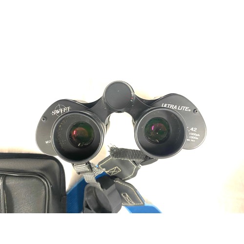 98 - Pair of cased Swift 8x42 ultra lite binoculars, fully multi coated