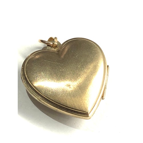 152 - 9ct gold double locket weight 3.9g