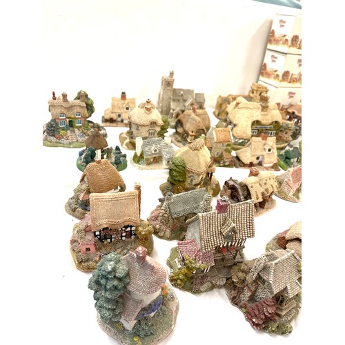 305 - Large selection of Lilliput lane and Milestone ornamental cottages