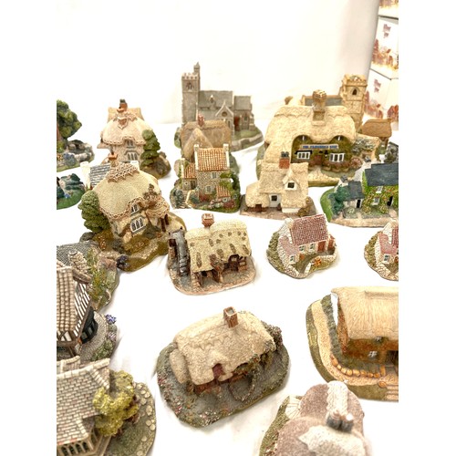 305 - Large selection of Lilliput lane and Milestone ornamental cottages