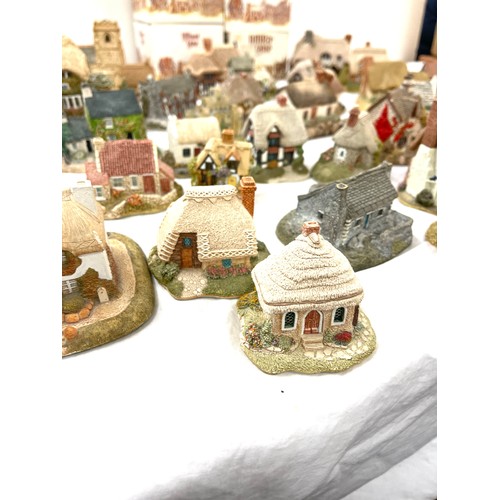 305 - Large selection of Lilliput lane and Milestone ornamental cottages