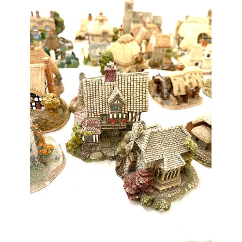 305 - Large selection of Lilliput lane and Milestone ornamental cottages