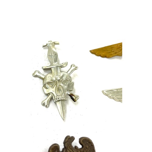 499 - Selection 6 German WW2 pin / cap badges