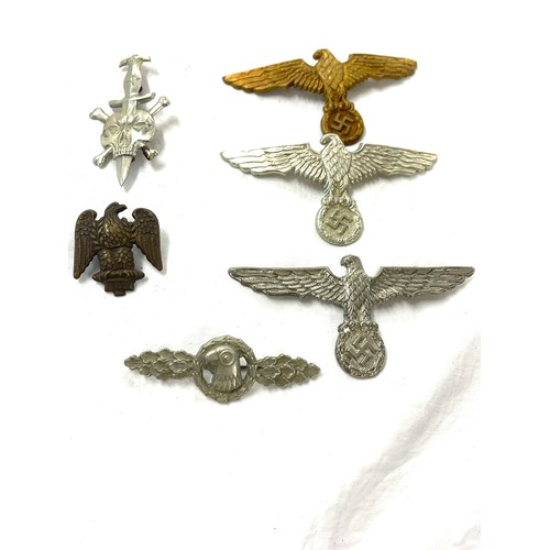 499 - Selection 6 German WW2 pin / cap badges