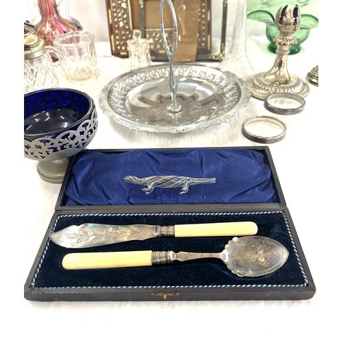 212 - Selection of miscellaneous collectables to include photo frames, glassware, various silver plate som... 