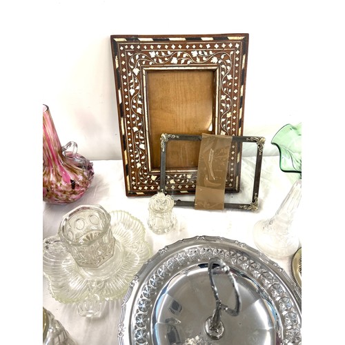 212 - Selection of miscellaneous collectables to include photo frames, glassware, various silver plate som... 