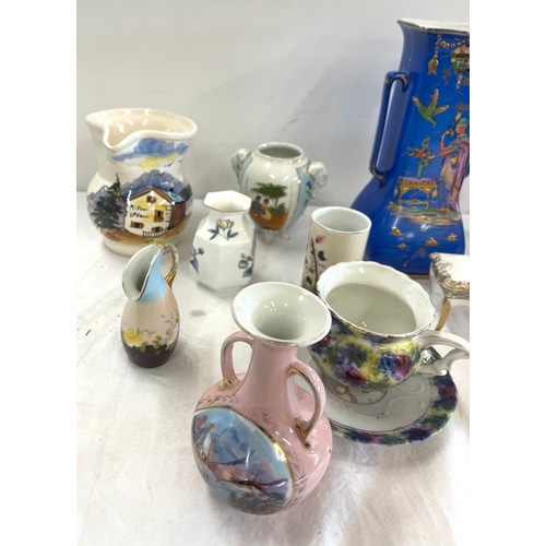 260 - Selection of collectable jugs and vases to include Royal Worcester, silver rimmed vase etc