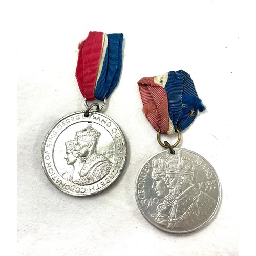 453 - 2 World War medals includes King George 6th Coronation medal, king George 5th silver Jubilee Medal b... 