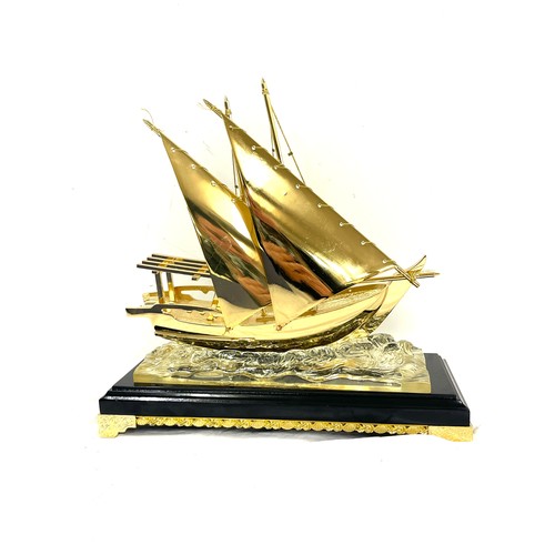 144 - Dhow model boat, Radium material coated in 24ct gold plate measures approx 12