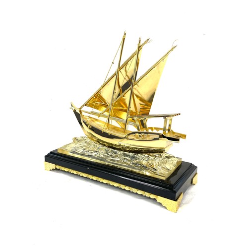 144 - Dhow model boat, Radium material coated in 24ct gold plate measures approx 12