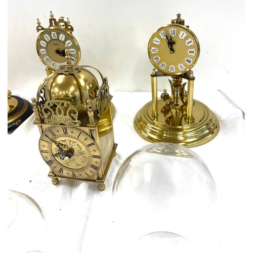 185 - 3 Vintage dome clocks without matching domes, 3 glass domes a mantel clock and spare working