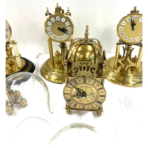 185 - 3 Vintage dome clocks without matching domes, 3 glass domes a mantel clock and spare working