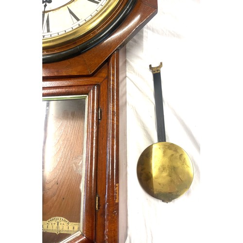 230 - US Anosnia 2 key hole wall clock with pendulum