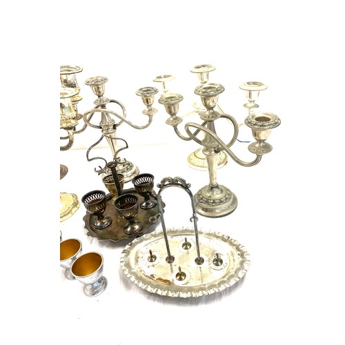 186 - Large selection of silver plated items includes candle sticks etc