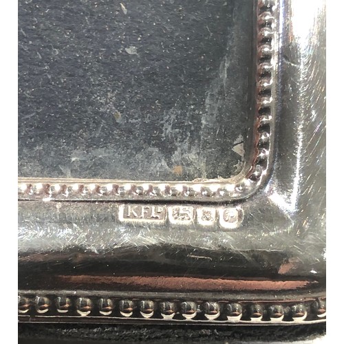 490 - 3 silver hallmarked picture frames largest measures approx 15cm by 11cm