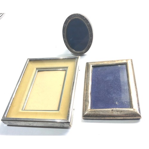 489 - 3 silver picture frames largest measures approx 14cm by 11cm