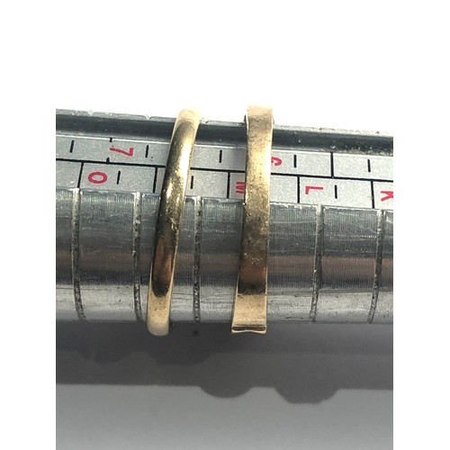 488 - 2 x 9ct gold diamond rings  (3.5g)