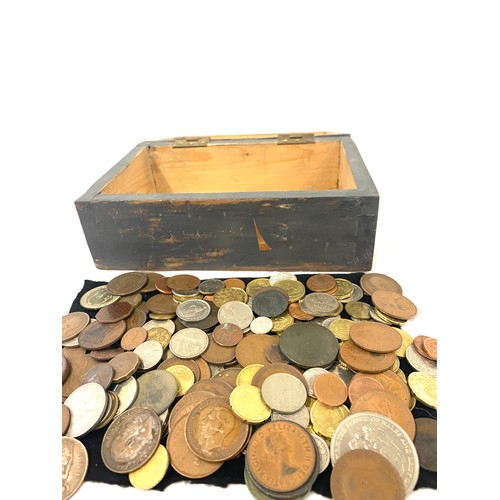 455 - Large selection of assorted coins in a wooden box