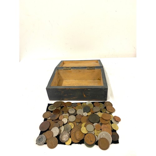 455 - Large selection of assorted coins in a wooden box