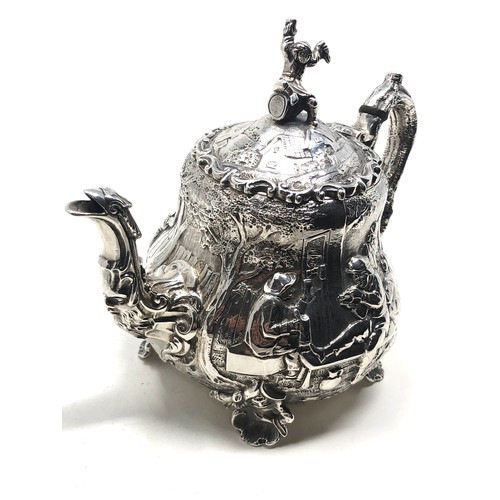 31 - Fine Antique Victorian silver bachelor teapot  either side with scenes after 