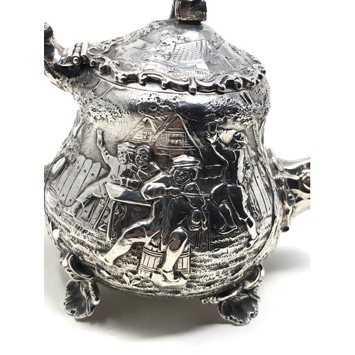 31 - Fine Antique Victorian silver bachelor teapot  either side with scenes after 