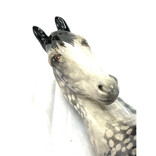 438 - Beswick rocking horse, grey, head tucked, leg up, overall good condition