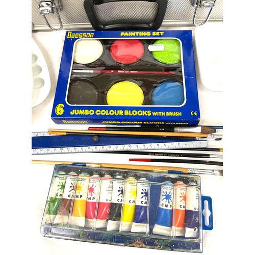 122 - Cased selection of artists equipment, includes paints, paint trays, brushes etc