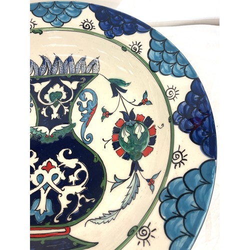 151 - Large decorative charger, approximate diameter 17 inches