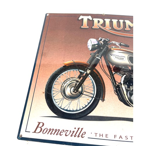 102 - Small Triumph metal sign, approximate measurements: 16 x 12 inches