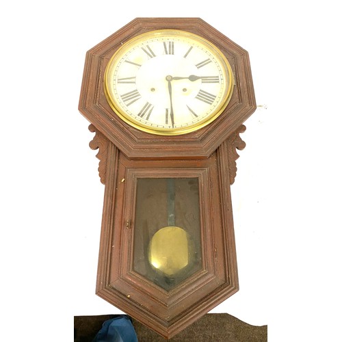 84 - 2 Keyhole wall clock with pendulum, untested