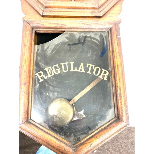 258 - 2 Keyhole oak regulator, with key and pendulum untested, broken glass