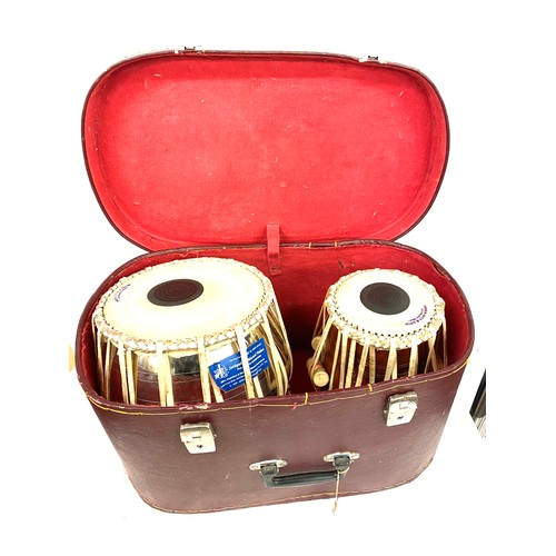 254 - Set of Akber miya & bros cased bongos/ drums