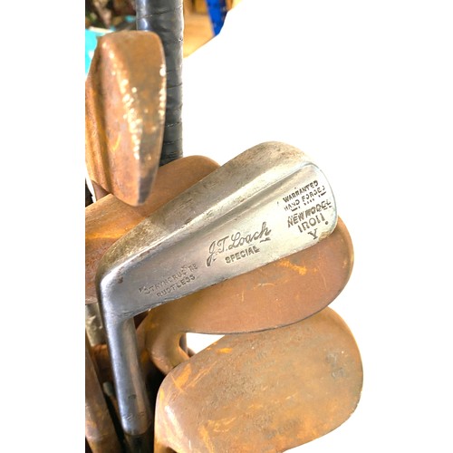 291 - Vintage golf clubs and golf bags