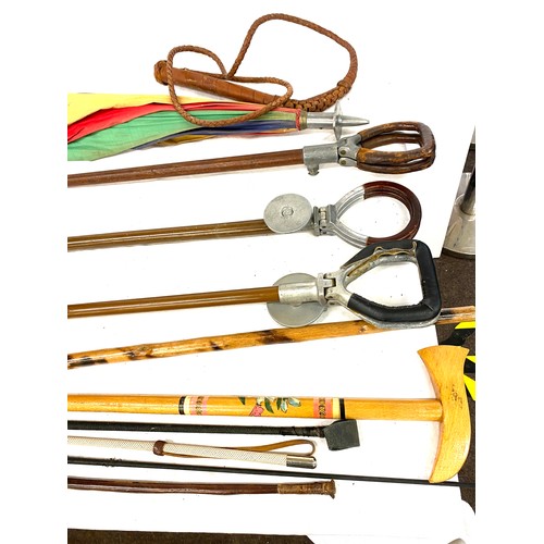 104A - Selection of 4 riding crops, 2 walking sticks and a whip