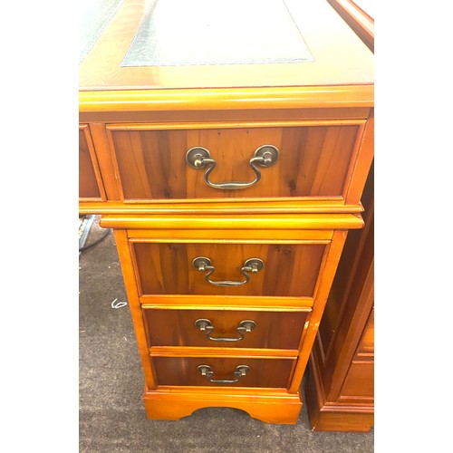 380 - 3 Piece leather topped yew wood desk with 6 draws and 1 cupboard measures approx 47.5