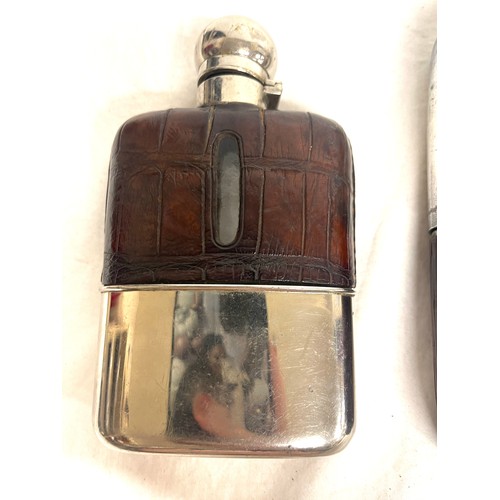 439 - 2 vintage silver plated, glass and leather hip flasks