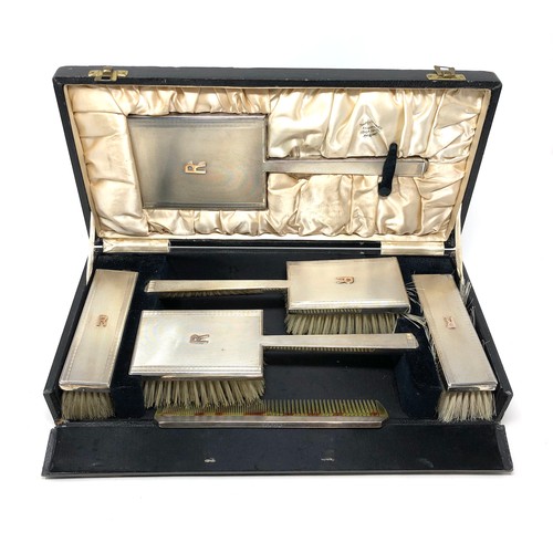 63 - Boxed silver brush set