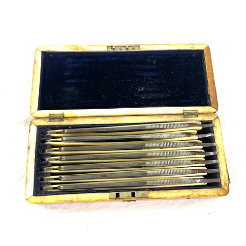 438 - Tortoiseshell box containing 7 cut throat razors