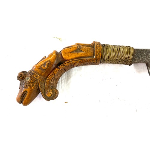 410 - Unusual rare Malaysian Klewang s type sword carved wooden handle of human form with monster head pom... 