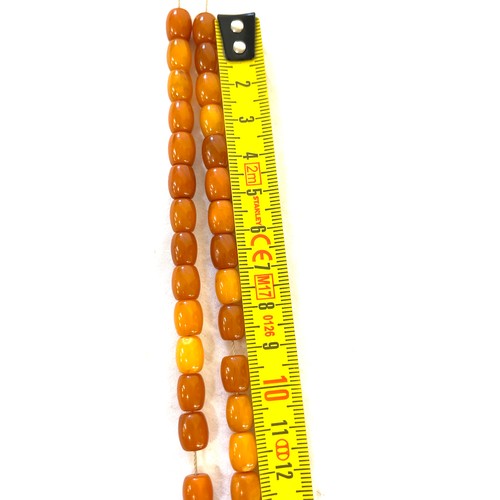 555 - Vintage long amber bead necklace, approximate weight of necklace 60.6g, length 177cm