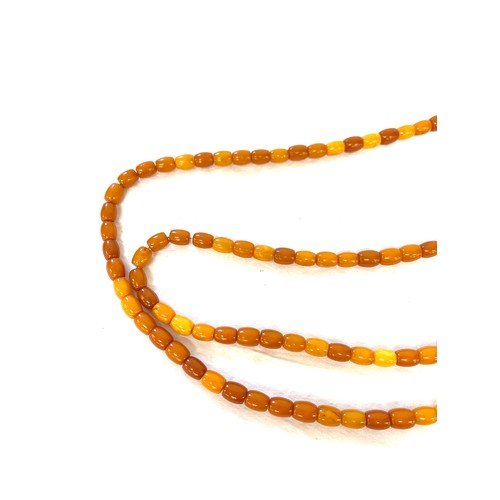 555 - Vintage long amber bead necklace, approximate weight of necklace 60.6g, length 177cm