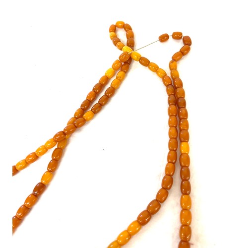 555 - Vintage long amber bead necklace, approximate weight of necklace 60.6g, length 177cm