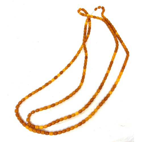 555 - Vintage long amber bead necklace, approximate weight of necklace 60.6g, length 177cm