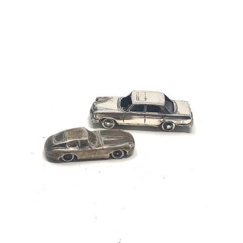 22 - 2 miniature silver cars