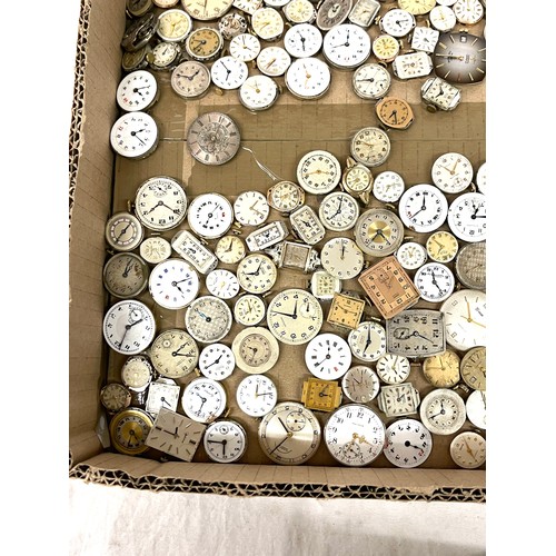 568 - Box of wristwatch movements, spares and repairs