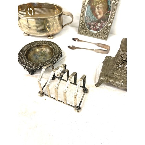 79 - Selection of silver plated items includes photo frames etc