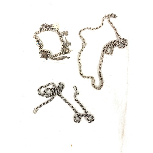 541 - Selection silver jewellery to include charm bracelet, guard chain, chains etc total approximate weig... 