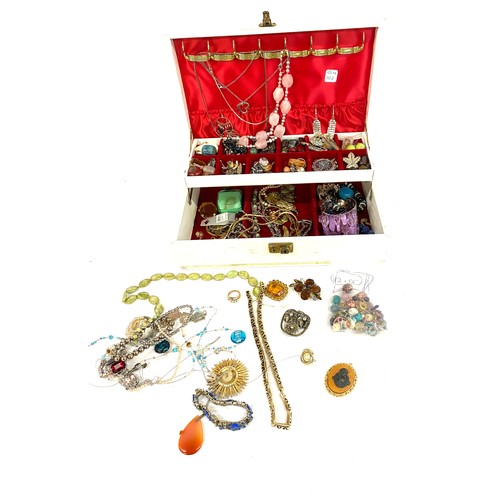 522 - Large selection of assorted costume jewellery in case