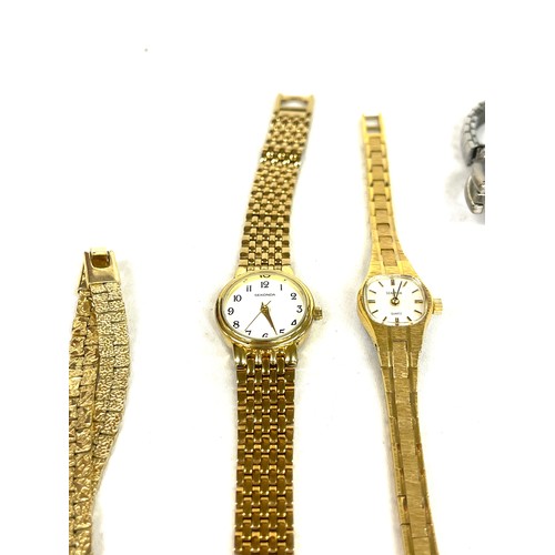 566 - Selection of ladies watches, gold tone necklace, watch strap etc