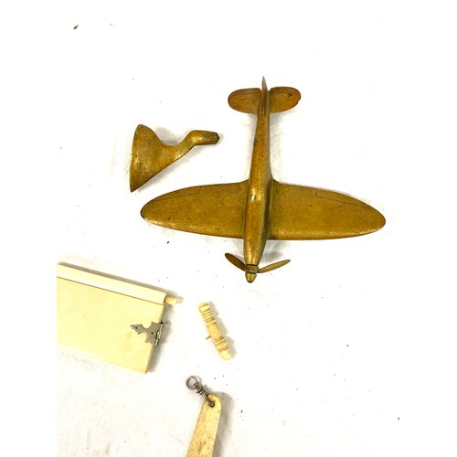 516 - WW2 trench art brass Spitfire plane, Victorian aide memoir, Sovereign case etc